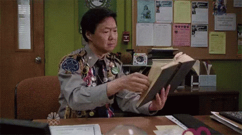 Teacher with book smiling gif