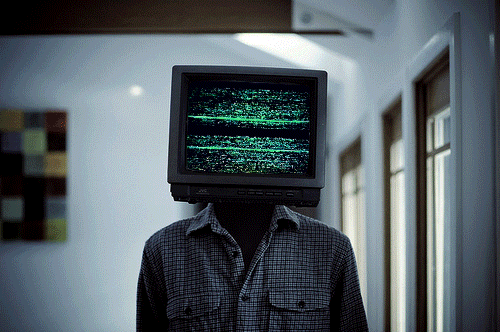 Man with monitor for a head gif