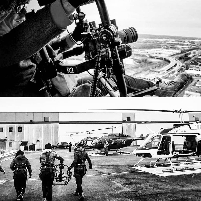 Filmmakers filming with a Ronin 2 and a RED Scarlet out of a helicopter over Manhattan.
