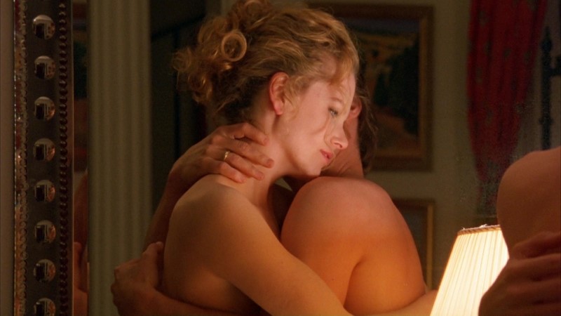 Tom Cruise embracing Nicole Kidman in Eyes Wide Shut (1999) | Warner Bros.