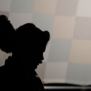 Silhouette of sound technician on set