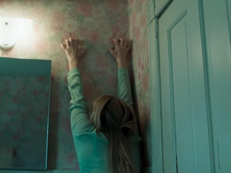 Grace scratching the walls of the bathroom - Die My Love